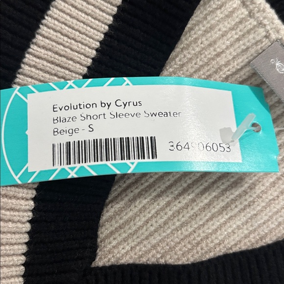 EVOLUTION BY CYRUS
Blaze Short Sleeve Sweater - Picture 5 of 5